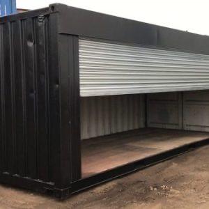 BLACK SHIPPING CONTAINER WITH ELECTRIFIED ROLL UP OPENING